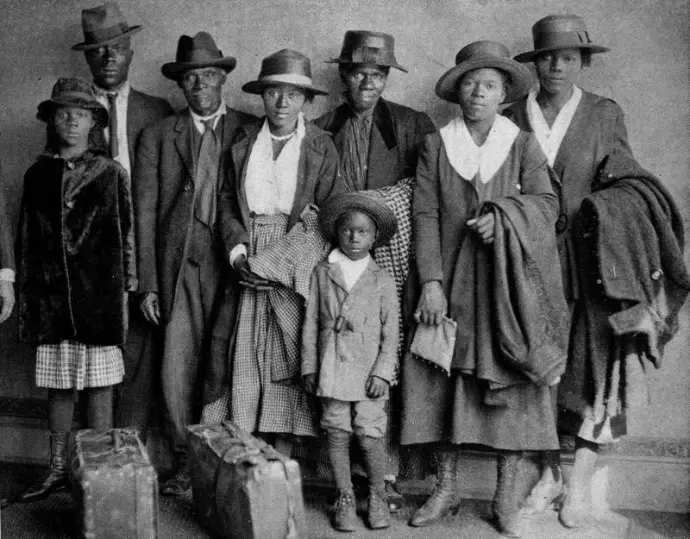 A family posing for a formal photograph